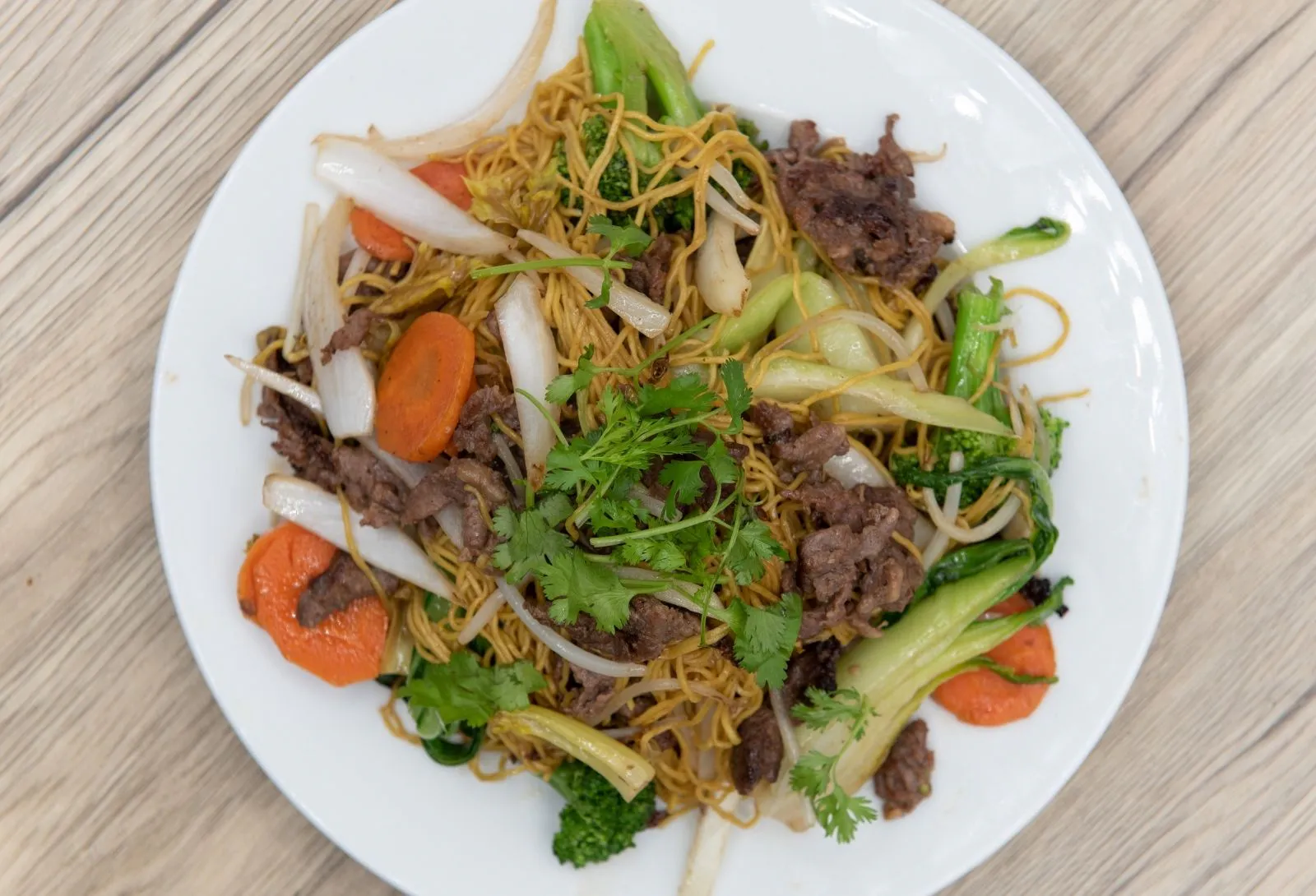 Beef chow mein mixed with broccoli, carrots and green veggies at Pho Saigon, a Vietnamese Restaurant in Grand Island